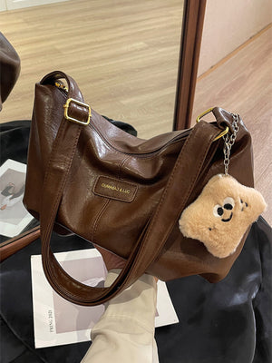PU Leather Crossbody Bag with Plush Charm